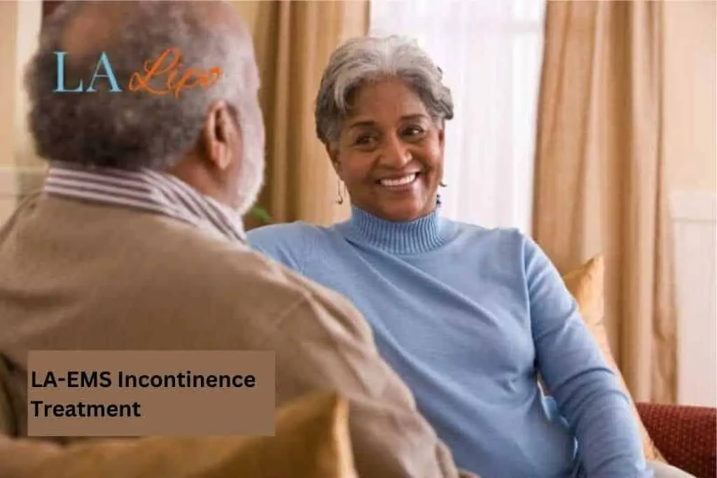Couple sat smiling at each other - LA-EMS treatment Ruislip